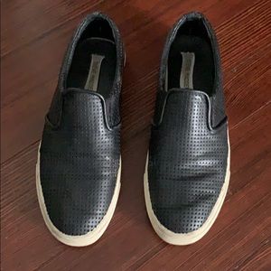 Steve Madden slip on leather street sneakers.